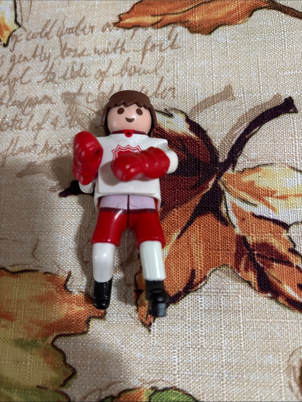 Red and White Hockey Player Toy Figure